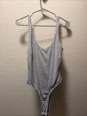 JLUXLABEL One- Piece Bodysuit w/ Skirt